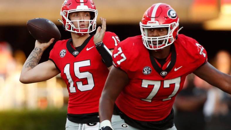 Georgia quarterback Carson Beck (15) looks to throw a pass during the first half of a NCAA college football game against Tennessee Martin in Athens, Ga., on Saturday, Sept. 2, 2023.