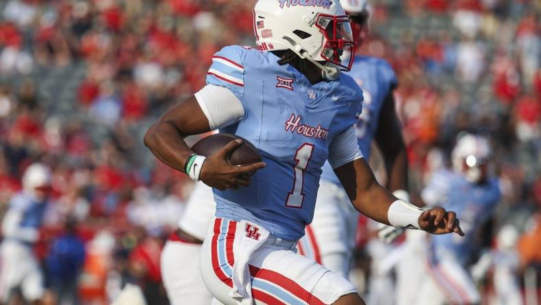 Sep 2, 2023; Houston, Texas, USA; Houston Cougars quarterback Donovan Smith (1) runs with the ball during the first quarter against the UTSA Roadrunners at TDECU Stadium. Mandatory Credit: Troy Taormina-USA TODAY Sports