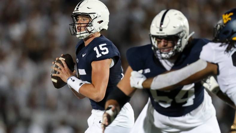 Sep 2, 2023; University Park, Pennsylvania, USA; Penn State Nittany Lions quarterback Drew Allar (15) drops back to throw against the West Virginia Mountaineers during the second quarter at Beaver Stadium. Mandatory Credit: Matthew O'Haren-USA TODAY Sports