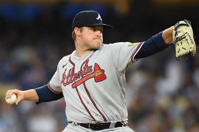Sep 2, 2023; Los Angeles, California, USA; Atlanta Braves starting pitcher Bryce Elder (55) throws a pitch against the Los Angeles Dodgers during the third inning at Dodger Stadium. Mandatory Credit: Jonathan Hui-USA TODAY Sports