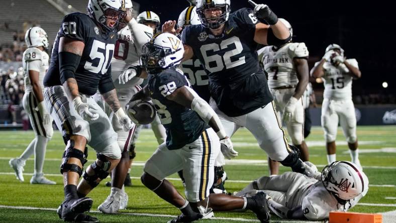 Vanderbilt running back Sedrick Alexander (28) reacts after scoring a touchdown against Alabama A&M during the fourth quarter at FirstBank Stadium in Nashville, Tenn., Saturday, Sept. 2, 2023.during the fourth quarter at FirstBank Stadium in Nashville, Tenn., Saturday, Sept. 2, 2023.