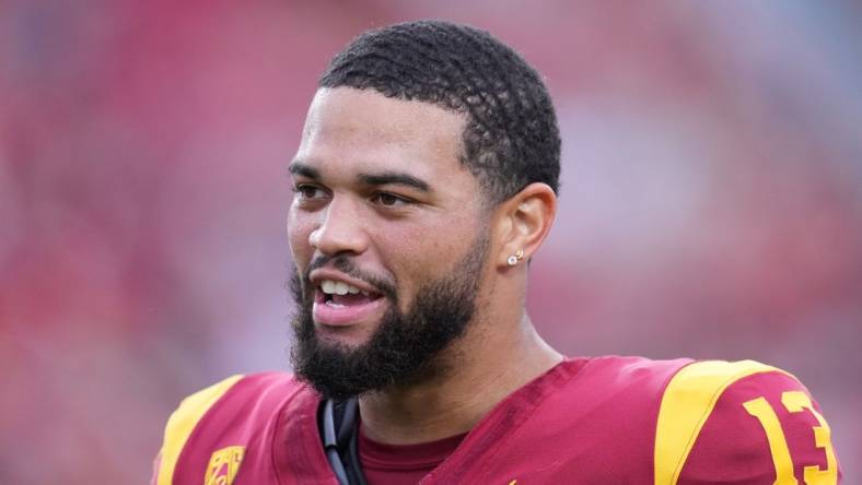 Sep 2, 2023; Los Angeles, California, USA; Southern California Trojans quarterback Caleb Williams (13) reacts against the Nevada Wolf Pack in the second half at United Airlines Field at Los Angeles Memorial Coliseum. Mandatory Credit: Kirby Lee-USA TODAY Sports