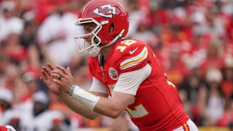 Aug 26, 2023; Kansas City, Missouri, USA; Kansas City Chiefs quarterback Patrick Mahomes (15) readies for the snap against the Cleveland Browns during the game at GEHA Field at Arrowhead Stadium. Mandatory Credit: Denny Medley-USA TODAY Sports