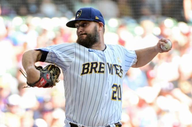 Sep 3, 2023; Milwaukee, Wisconsin, USA; Milwaukee Brewers pitcher Wade Miley (20) pitches against the Philadelphia Phillies in the first inning at American Family Field. Mandatory Credit: Benny Sieu-USA TODAY Sports