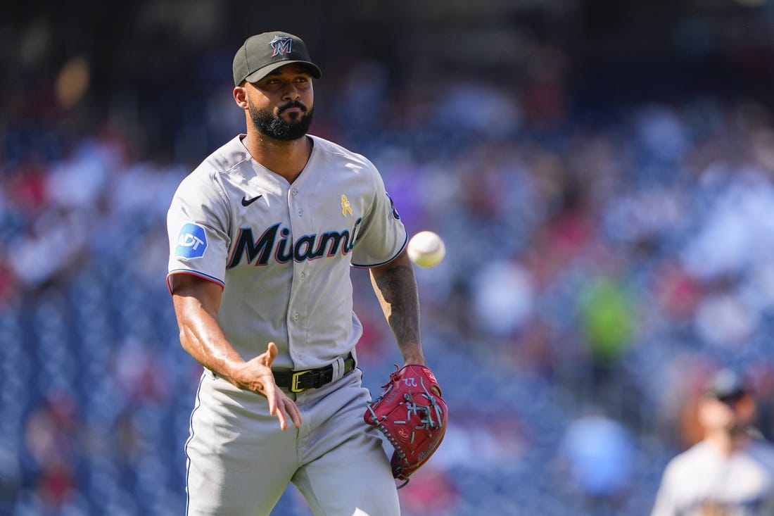 Sep 3, 2023; Washington, District of Columbia, USA;  Miami Marlins pitcher Sandy Alcantara (22) tosses to first base to record an out against the Washington Nationals during the sixth inning at Nationals Park. Mandatory Credit: Gregory Fisher-USA TODAY Sports