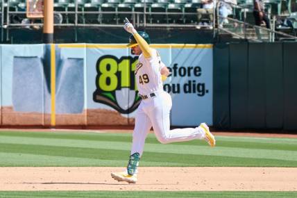 Sep 3, 2023; Oakland, California, USA; Oakland Athletics infielder Ryan Noda (49) reacts while running the bases after hitting a two run home run against the Los Angeles Angels during the sixth inning at Oakland-Alameda County Coliseum. Mandatory Credit: Robert Edwards-USA TODAY Sports