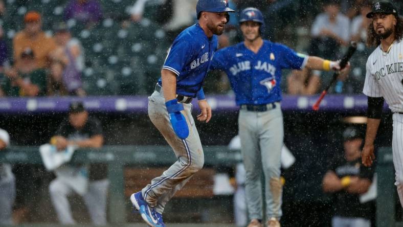 Sep 3, 2023; Denver, Colorado, USA; Toronto Blue Jays shortstop Mason McCoy (10) scores on an RBI in the ninth inning against the Colorado Rockies at Coors Field. Mandatory Credit: Isaiah J. Downing-USA TODAY Sports