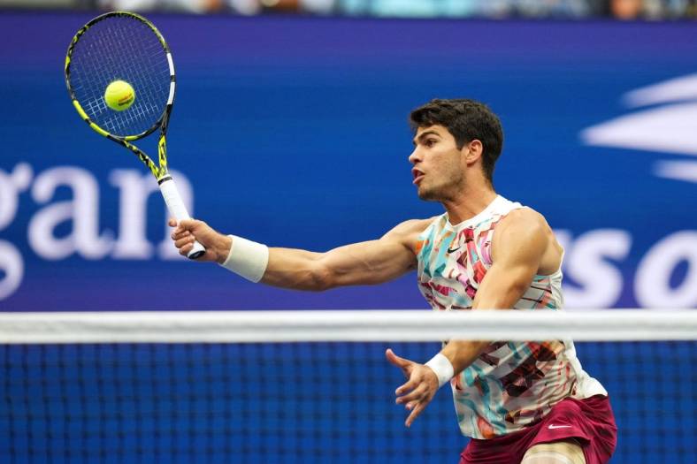 Sep 4, 2023; Flushing, NY, USA; Carlos Alcaraz of Spain hits to Matteo Arnaldi of Italy on day eight of the 2023 U.S. Open tennis tournament at USTA Billie Jean King National Tennis Center. Mandatory Credit: Danielle Parhizkaran-USA TODAY Sports