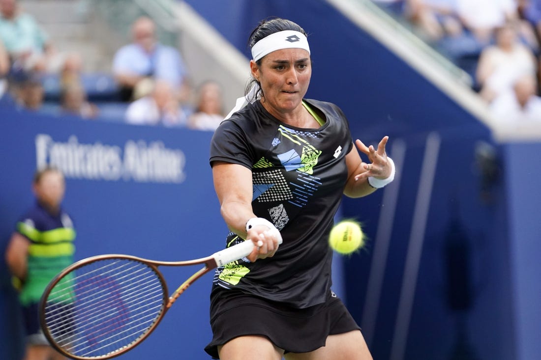 Sep 4, 2023; Flushing, NY, USA; Ons Jabeur of Tunisia hits to Qinwen Zheng of China on day eight of the 2023 U.S. Open tennis tournament at USTA Billie Jean King National Tennis Center. Mandatory Credit: Danielle Parhizkaran-USA TODAY Sports