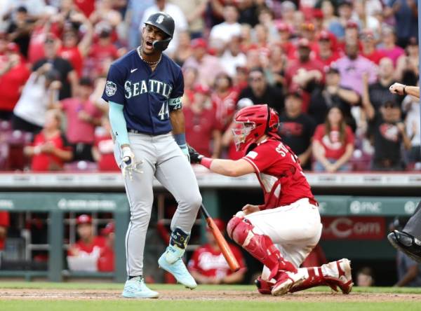 Sep 4, 2023; Cincinnati, Ohio, USA; Seattle Mariners center fielder Julio Rodriguez (44) reacts after striking out ending the game against the Cincinnati Reds during the ninth inning at Great American Ball Park. Mandatory Credit: David Kohl-USA TODAY Sports