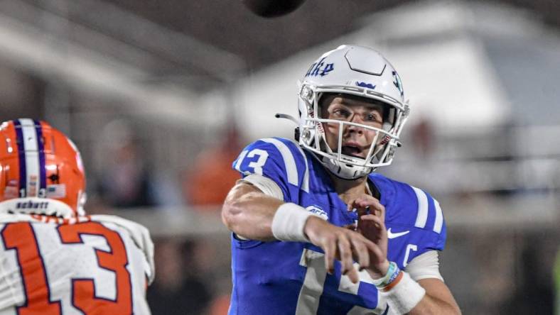 Sep 4, 2023; Durham, North Carolina, USA; Duke University quarterback Riley Leonard (13) passed the ball against Clemson during the first quarter of the season opening game at Wallace Wade Stadium in Durham, N.C. Monday, Sept 4, 2023. Mandatory Credit: Ken Ruinard-USA TODAY Sports