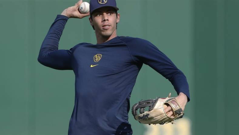 Sep 5, 2023; Pittsburgh, Pennsylvania, USA; Milwaukee Brewers left fielder Christian Yelich (22) warms up before the game against the Pittsburgh Pirates at PNC Park. Mandatory Credit: Charles LeClaire-USA TODAY Sports