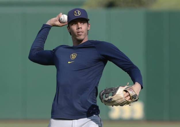 Sep 5, 2023; Pittsburgh, Pennsylvania, USA; Milwaukee Brewers left fielder Christian Yelich (22) warms up before the game against the Pittsburgh Pirates at PNC Park. Mandatory Credit: Charles LeClaire-USA TODAY Sports