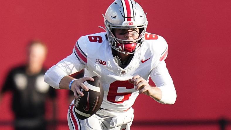 Sep 2, 2023; Bloomington, Indiana, USA; Ohio State Buckeyes quarterback Kyle McCord (6) runs during the NCAA football game at Indiana University Memorial Stadium. Ohio State won 23-3.