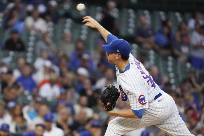 Sep 5, 2023; Chicago, Illinois, USA; Chicago Cubs starting pitcher Kyle Hendricks (28) throws the ball against the San Francisco Giants during the first inning at Wrigley Field. Mandatory Credit: David Banks-USA TODAY Sports