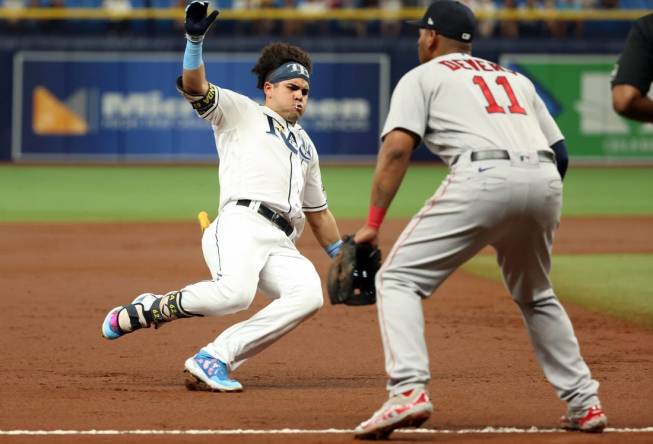 Sep 5, 2023; St. Petersburg, Florida, USA; Tampa Bay Rays second baseman Jonathan Aranda (62) hits a RBI triple during the second inning against the Boston Red Sox at Tropicana Field. Mandatory Credit: Kim Klement Neitzel-USA TODAY Sports