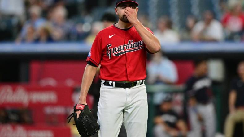 Sep 5, 2023; Cleveland, Ohio, USA; Cleveland Guardians relief pitcher Matt Moore (55) reacts after giving up a home run during the sixth inning against the Minnesota Twins at Progressive Field. Mandatory Credit: Ken Blaze-USA TODAY Sports