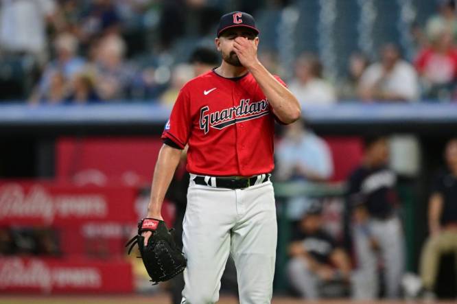 Sep 5, 2023; Cleveland, Ohio, USA; Cleveland Guardians relief pitcher Matt Moore (55) reacts after giving up a home run during the sixth inning against the Minnesota Twins at Progressive Field. Mandatory Credit: Ken Blaze-USA TODAY Sports