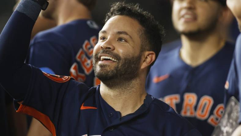 Sep 5, 2023; Arlington, Texas, USA; Houston Astros second baseman Jose Altuve (27) is congratulated by his teammates after hitting a solo home run in the first inning against the Texas Rangers at Globe Life Field. Mandatory Credit: Tim Heitman-USA TODAY Sports