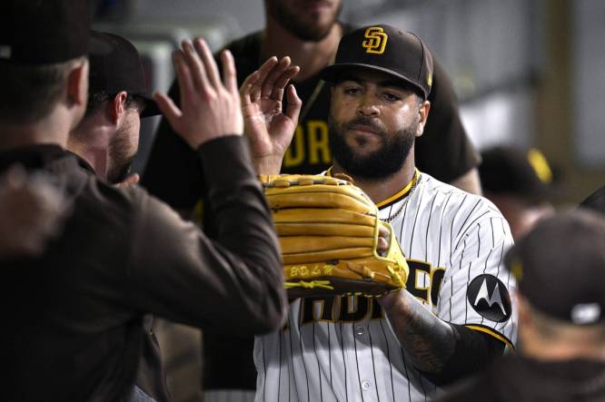 Sep 5, 2023; San Diego, California, USA; San Diego Padres starting pitcher Pedro Avila (60) is congratulated in the dugout after a pitching change in the seventh inning against the Philadelphia Phillies at Petco Park. Mandatory Credit: Orlando Ramirez-USA TODAY Sports