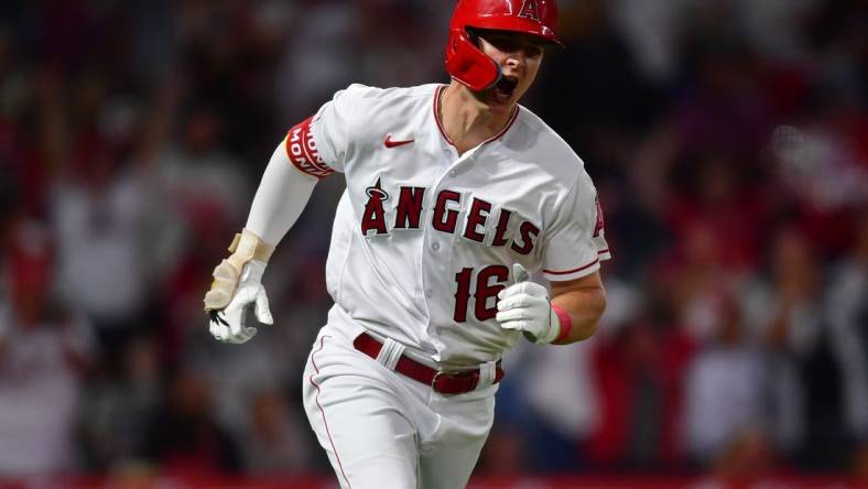 Sep 5, 2023; Anaheim, California, USA; Los Angeles Angels center fielder Mickey Moniak (16) reacts after hititng an RBI single against the Baltimore Orioles during the ninth inning at Angel Stadium. Mandatory Credit: Gary A. Vasquez-USA TODAY Sports