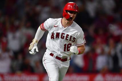 Sep 5, 2023; Anaheim, California, USA; Los Angeles Angels center fielder Mickey Moniak (16) reacts after hititng an RBI single against the Baltimore Orioles during the ninth inning at Angel Stadium. Mandatory Credit: Gary A. Vasquez-USA TODAY Sports