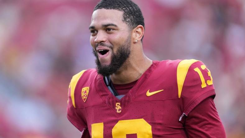 Sep 2, 2023; Los Angeles, California, USA; Southern California Trojans quarterback Caleb Williams (13) reacts against the Nevada Wolf Pack in the second half at United Airlines Field at Los Angeles Memorial Coliseum. Mandatory Credit: Kirby Lee-USA TODAY Sports