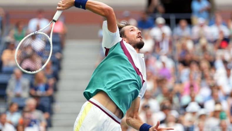 Sep 6, 2023; Flushing, NY, USA; Daniil Medvedev serves to Andrey Rublev on day ten of the 2023 U.S. Open tennis tournament at USTA Billie Jean King National Tennis Center. Mandatory Credit: Danielle Parhizkaran-USA TODAY Sports