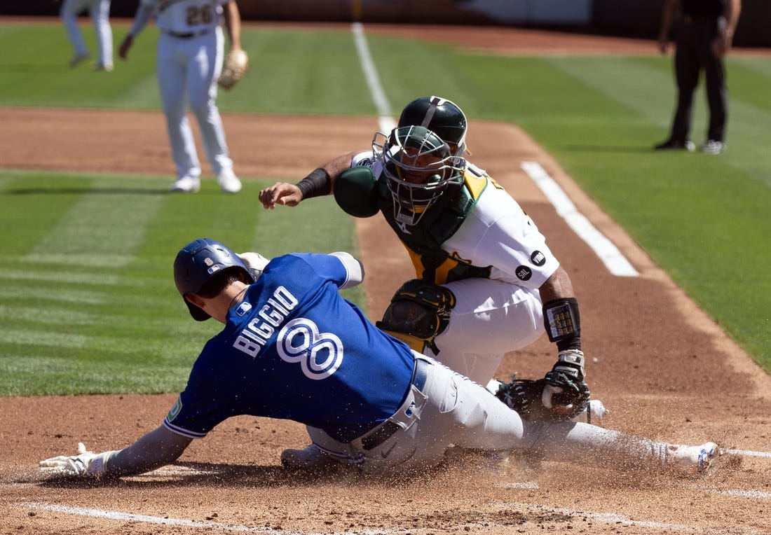 A's win 5-3 to secure rare series win at home over Blue Jays