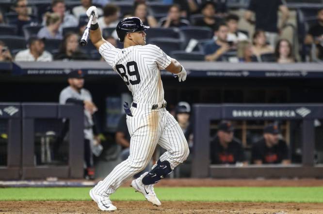 Sep 6, 2023; Bronx, New York, USA;  New York Yankees center fielder Jasson Dominguez (89) hits a single in the sixth inning against the Detroit Tigers at Yankee Stadium. Mandatory Credit: Wendell Cruz-USA TODAY Sports