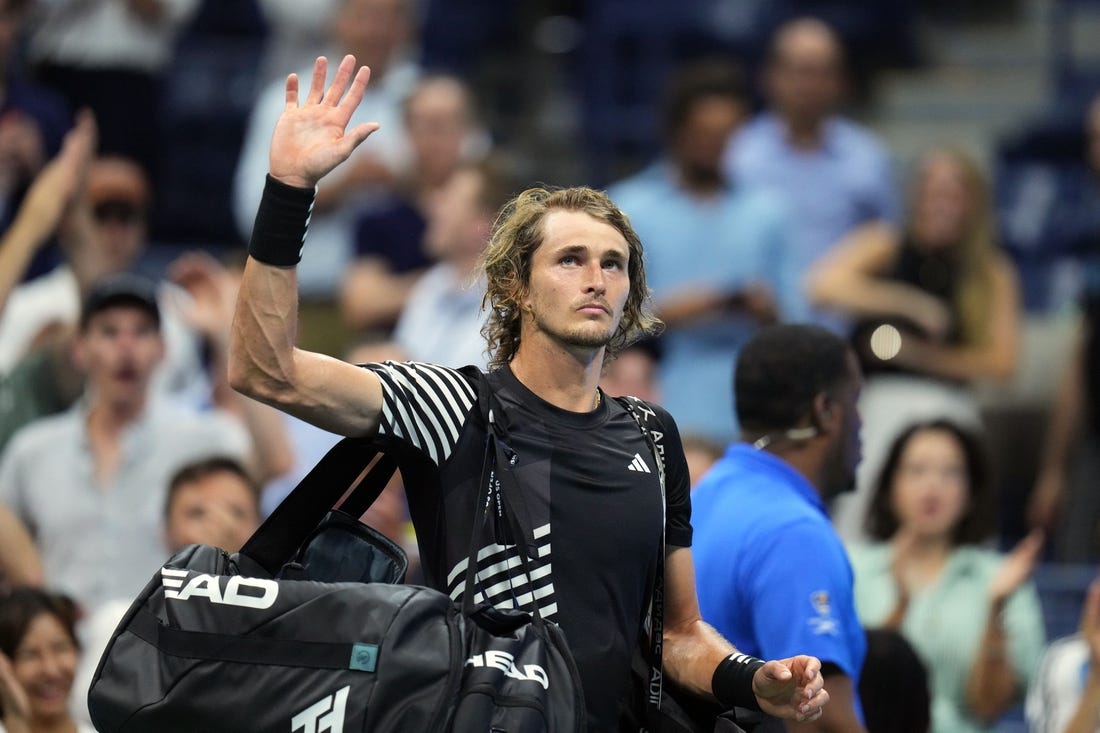 Sep 6, 2023; Flushing, NY, USA; Alexander Zverev of Germany waves to the crowd after losing to Carlos Alcaraz of Spain on day ten of the 2023 U.S. Open tennis tournament at USTA Billie Jean King National Tennis Center. Mandatory Credit: Danielle Parhizkaran-USA TODAY Sports