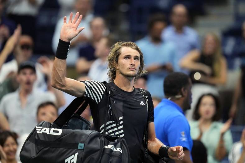 Sep 6, 2023; Flushing, NY, USA; Alexander Zverev of Germany waves to the crowd after losing to Carlos Alcaraz of Spain on day ten of the 2023 U.S. Open tennis tournament at USTA Billie Jean King National Tennis Center. Mandatory Credit: Danielle Parhizkaran-USA TODAY Sports