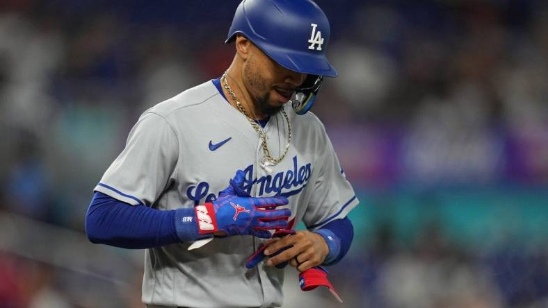 Sep 7, 2023; Miami, Florida, USA; Los Angeles Dodgers right fielder Mookie Betts (50) walks in the first inning against the Miami Marlins at loanDepot Park. Mandatory Credit: Jim Rassol-USA TODAY Sports