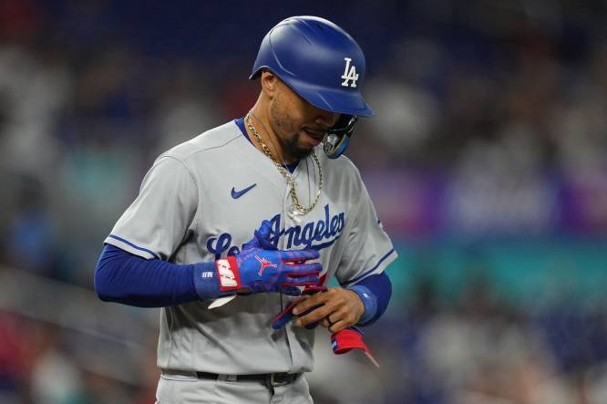 Sep 7, 2023; Miami, Florida, USA; Los Angeles Dodgers right fielder Mookie Betts (50) walks in the first inning against the Miami Marlins at loanDepot Park. Mandatory Credit: Jim Rassol-USA TODAY Sports