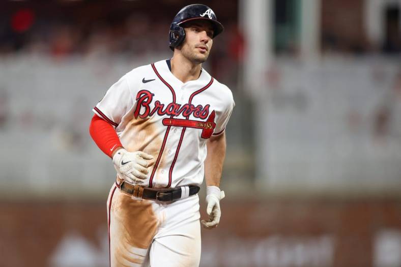 Sep 7, 2023; Atlanta, Georgia, USA; Atlanta Braves first baseman Matt Olson (28) hits a home run against the St. Louis Cardinals in the fifth inning at Truist Park. Mandatory Credit: Brett Davis-USA TODAY Sports