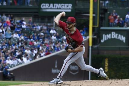 Sep 8, 2023; Chicago, Illinois, USA;  Arizona Diamondbacks starting pitcher Zac Gallen (23) delivers a pitch against the Chicago Cubs during the first inning at Wrigley Field. Mandatory Credit: Matt Marton-USA TODAY Sports