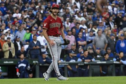 Sep 8, 2023; Chicago, Illinois, USA;  Arizona Diamondbacks starting pitcher Zac Gallen (23) reacts at the end of the game against the Chicago Cubs at Wrigley Field. Mandatory Credit: Matt Marton-USA TODAY Sports