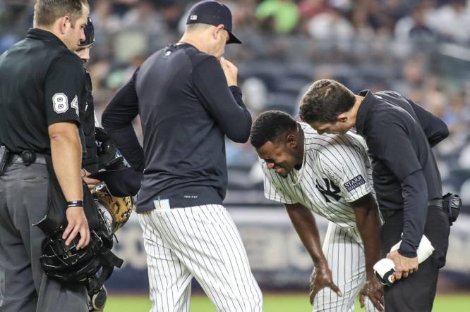 Sep 8, 2023; Bronx, New York, USA;  New York Yankees starting pitcher Luis Severino (40) grimaces after getting injured in the fifth inning against the Milwaukee Brewers at Yankee Stadium. Mandatory Credit: Wendell Cruz-USA TODAY Sports