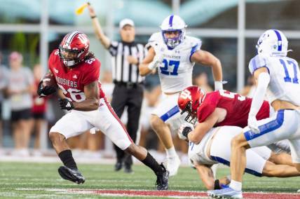 Sep 8, 2023; Bloomington, Indiana, USA; Indiana Hoosiers running back Josh Henderson (26) runs the ball in the first half against the Indiana State Sycamores at Memorial Stadium. Mandatory Credit: Trevor Ruszkowski-USA TODAY Sports