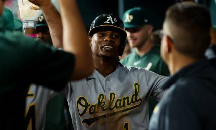 Sep 8, 2023; Arlington, Texas, USA;  Oakland Athletics center fielder Esteury Ruiz (1) celebrates with teammates after hitting a home run during the fifth inning against the Texas Rangers at Globe Life Field. Mandatory Credit: Kevin Jairaj-USA TODAY Sports