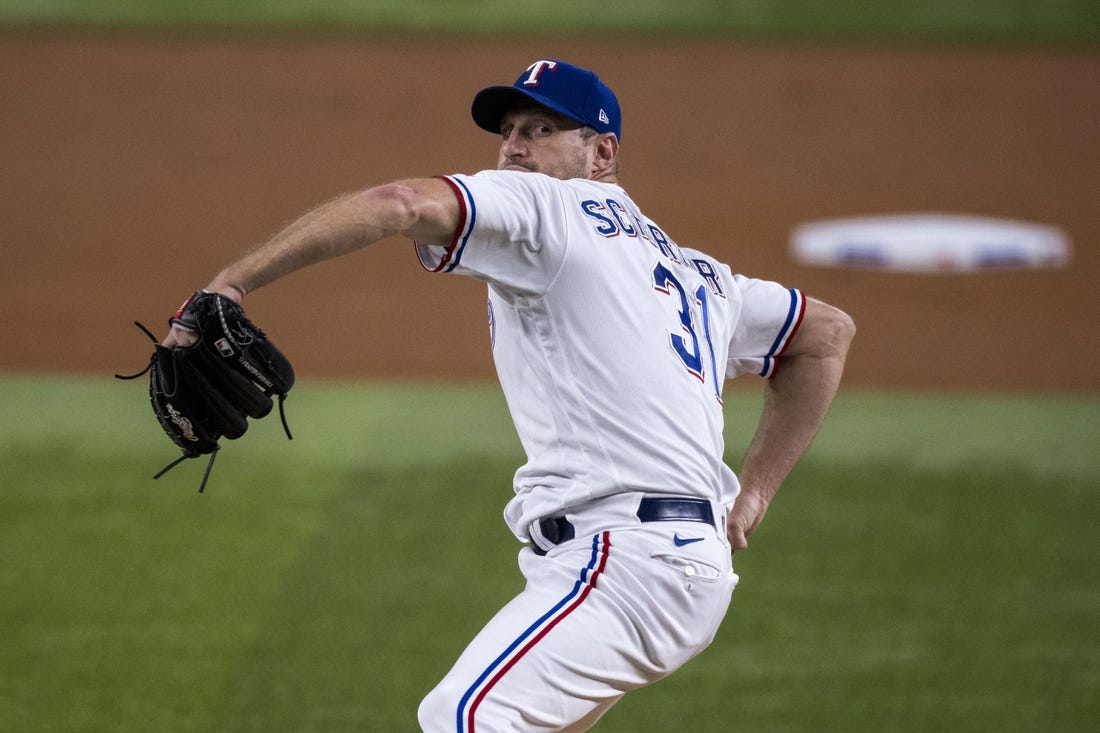 To the Max: See photos as Max Scherzer earns the win in his Rangers debut