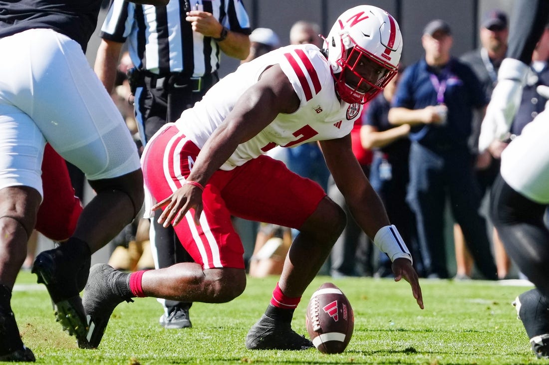 Sep 9, 2023; Boulder, Colorado, USA; Nebraska Cornhuskers quarterback Jeff Sims (7) fumbles a snap against the Colorado Buffaloes in the first quarter at Folsom Field. Mandatory Credit: Ron Chenoy-USA TODAY Sports