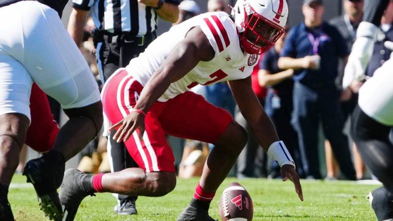 Sep 9, 2023; Boulder, Colorado, USA; Nebraska Cornhuskers quarterback Jeff Sims (7) fumbles a snap against the Colorado Buffaloes in the first quarter at Folsom Field. Mandatory Credit: Ron Chenoy-USA TODAY Sports