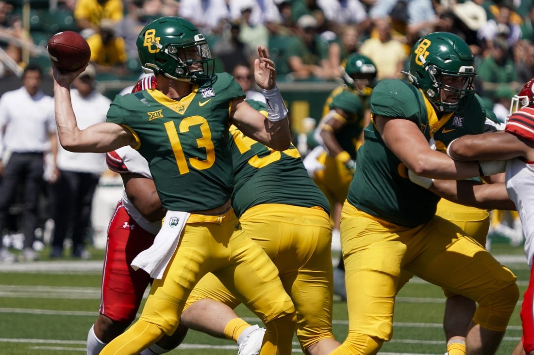 Sep 9, 2023; Waco, Texas, USA; Baylor Bears quarterback Sawyer Robertson (13) throws downfield against the Utah Utes during the first half at McLane Stadium. Mandatory Credit: Raymond Carlin III-USA TODAY Sports