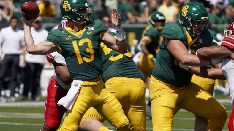 Sep 9, 2023; Waco, Texas, USA; Baylor Bears quarterback Sawyer Robertson (13) throws downfield against the Utah Utes during the first half at McLane Stadium. Mandatory Credit: Raymond Carlin III-USA TODAY Sports