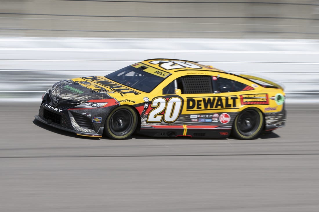 Sep 9, 2023; Kansas City, Kansas, USA; NASCAR Cup Series driver Christopher Bell (20) drives during NASCAR Cup Practice at Kansas Speedway. Mandatory Credit: Amy Kontras-USA TODAY Sports