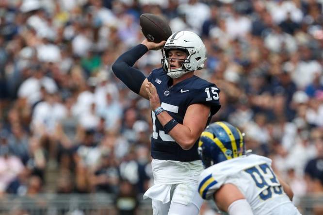 Sep 9, 2023; University Park, Pennsylvania, USA; Penn State Nittany Lions quarterback Drew Allar (15) throws a pass during the first quarter against the Delaware Fightin' Blue Hens at Beaver Stadium. Mandatory Credit: Matthew O'Haren-USA TODAY Sports