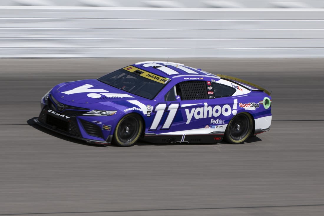 Sep 9, 2023; Kansas City, Kansas, USA; NASCAR Cup Series driver Denny Hamlin (11) drives during NASCAR Cup Practice at Kansas Speedway. Mandatory Credit: Amy Kontras-USA TODAY Sports