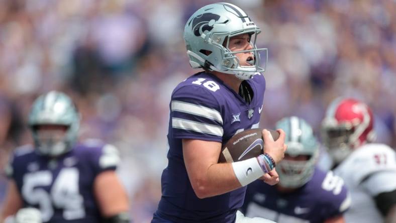 Kansas State senior quarterback Will Howard (18) runs in for a touchdown in the third quarter of Saturday's game against Troy inside Bill Snyder Family Stadium.