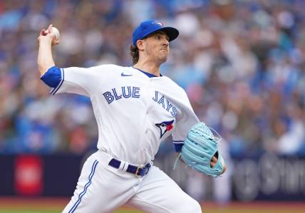 Sep 9, 2023; Toronto, Ontario, CAN; Toronto Blue Jays starting pitcher Kevin Gausman (34) pitches against the Kansas City Royals during the first inning at Rogers Centre. Mandatory Credit: Nick Turchiaro-USA TODAY Sports